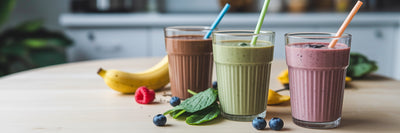 Three colorful vegan protein smoothies.