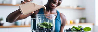 Person making a healthy vegan protein shake.