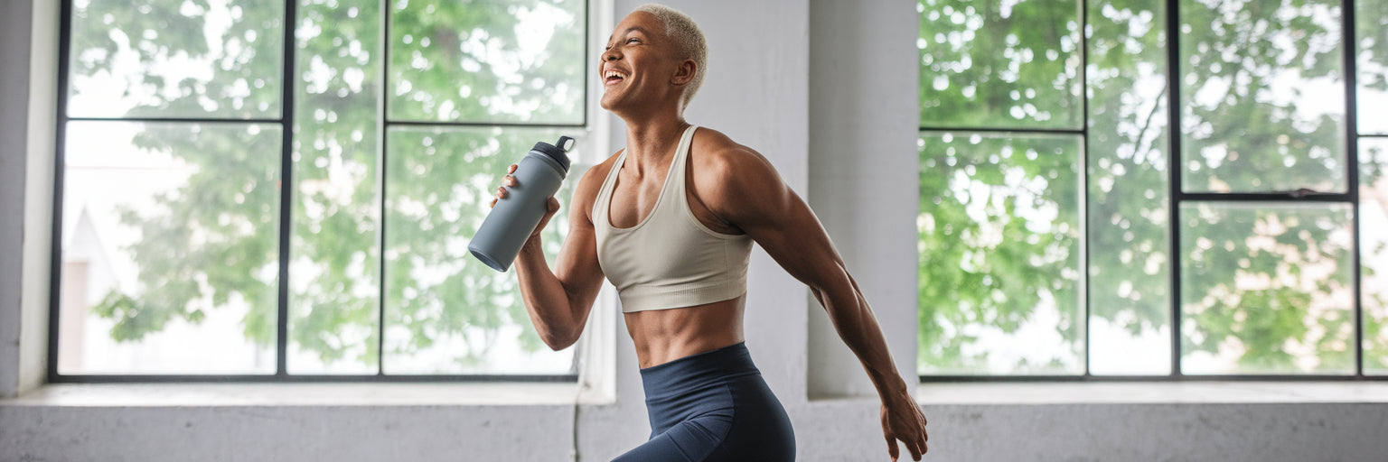 Energized vegan athlete in a gym.