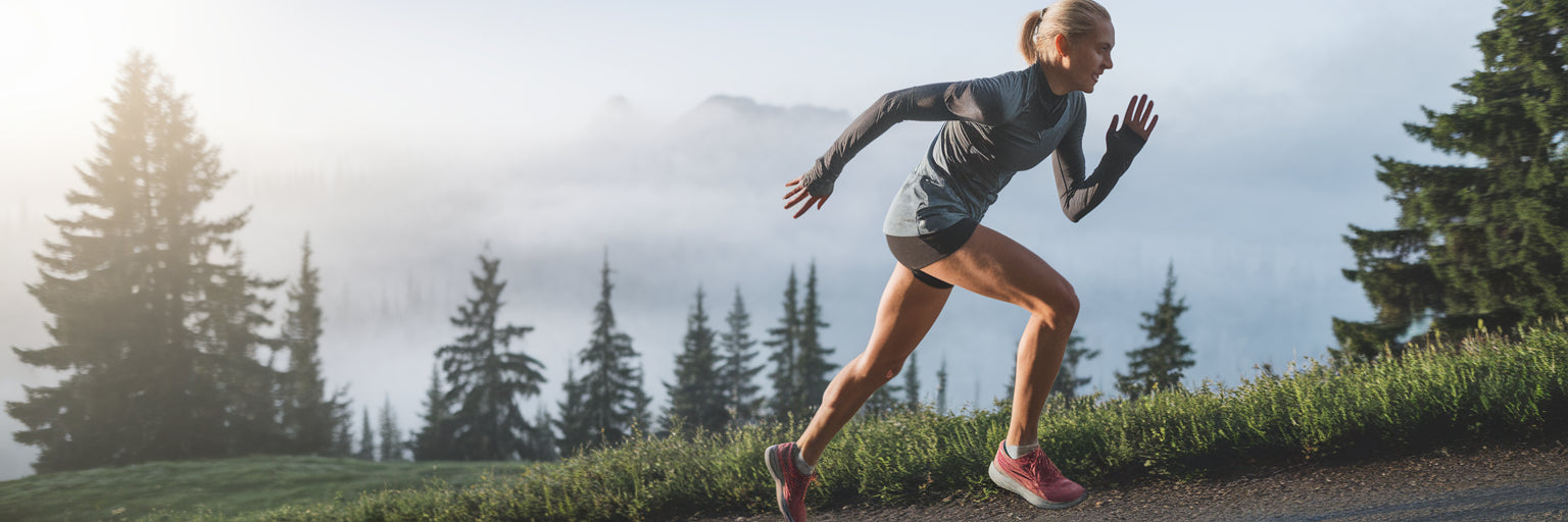 Active person running on scenic trail.