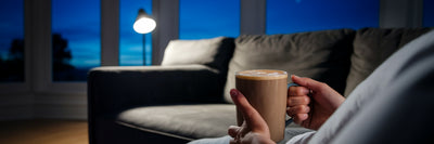 Person relaxing with a healthy evening drink