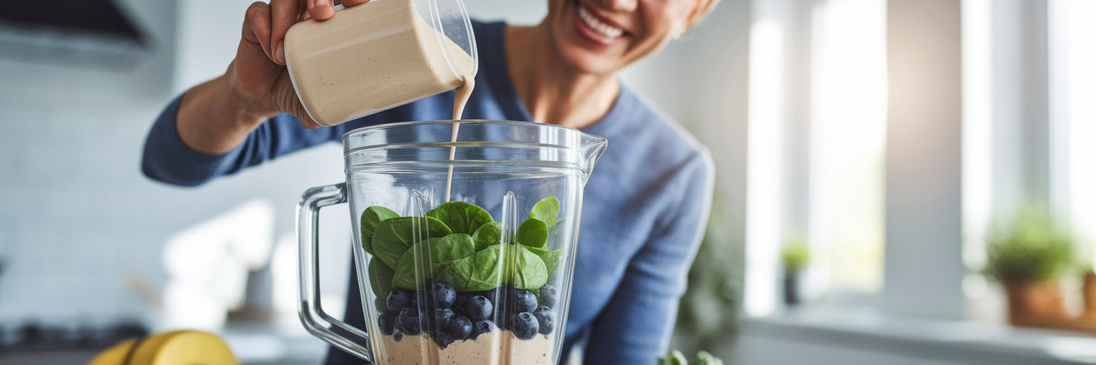 Adding vegan protein powder to a smoothie.