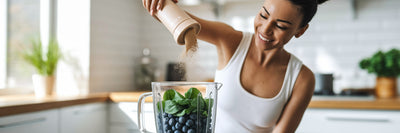 Woman making a vegan protein smoothie
