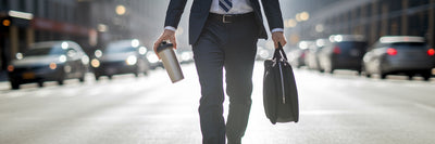 Professional walking with vegan protein shake.