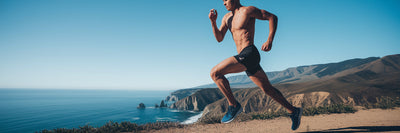 Vegan endurance athlete running powerfully.