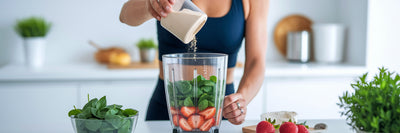 Person making a vegan protein smoothie