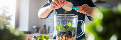 Adding vegan protein powder to blender
