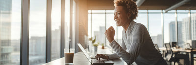 Person feeling energized at work desk.