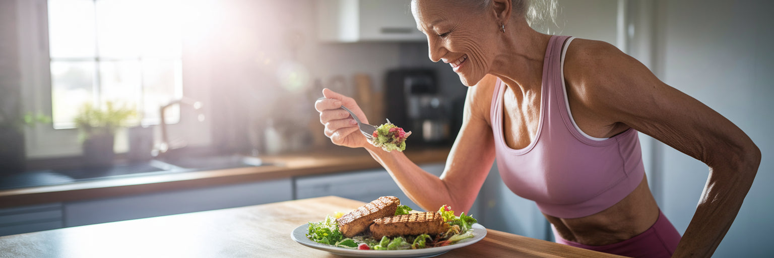 Woman over 40 enjoying vegan meal.
