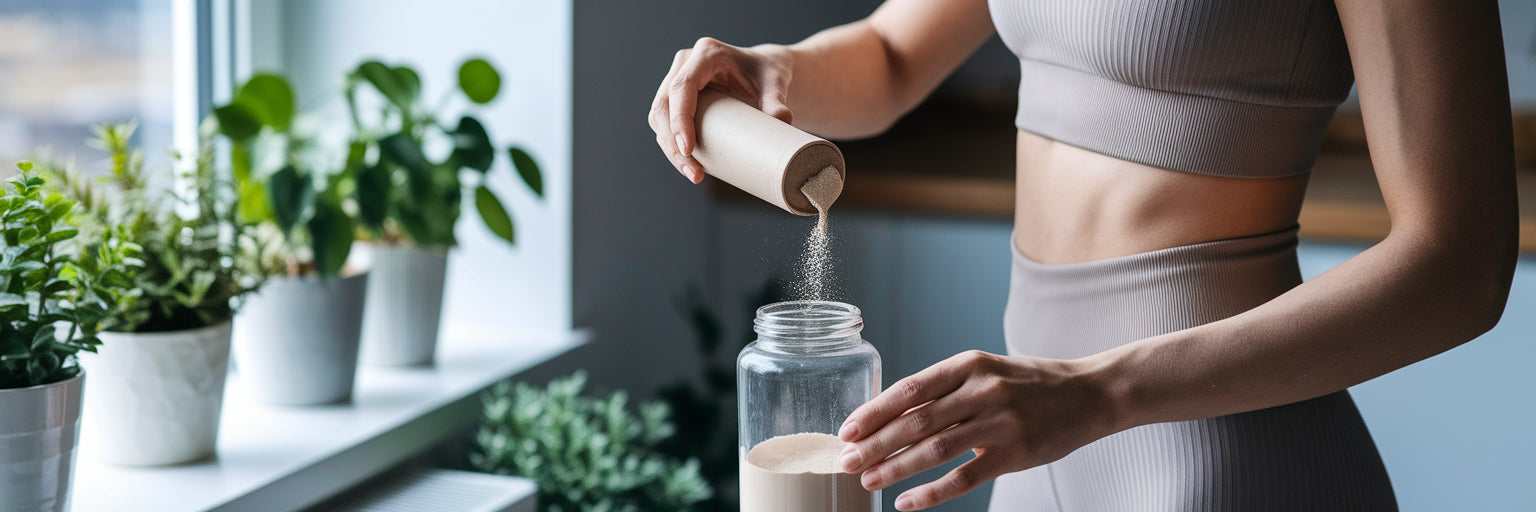 Person scooping vegan protein powder.