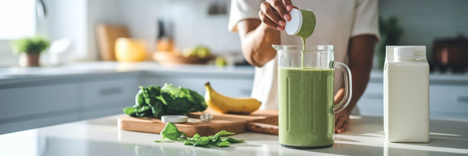 Preparing a vegan protein shake in a sunlit kitchen.