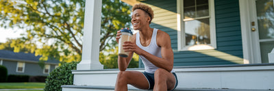 Athlete enjoying post-workout vegan protein shake.