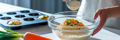 Adding vegan protein to savory muffin batter.