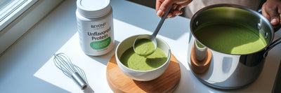 Ladling high-protein vegan soup into a bowl.