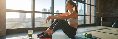 Woman recovering with vegan protein smoothie.