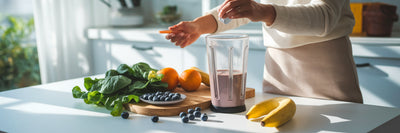 Preparing a healthy vegan protein smoothie.