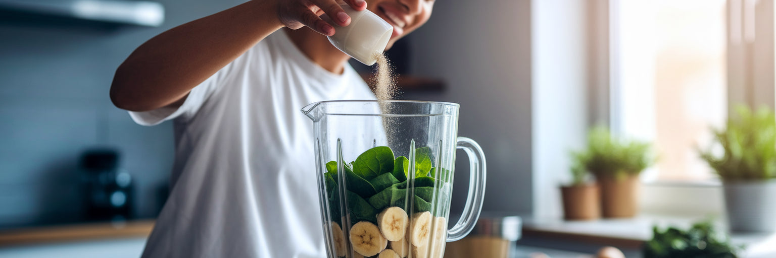 Person making a vegan protein smoothie