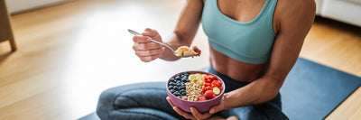 Person enjoying a vegan smoothie bowl