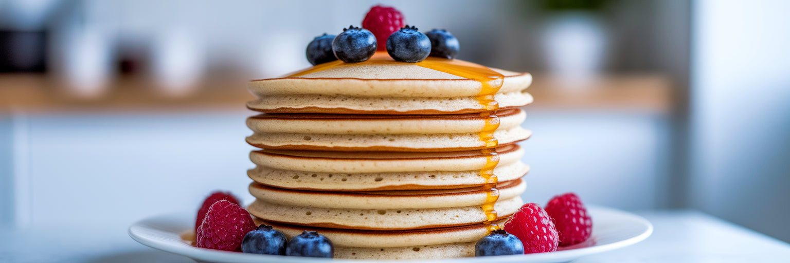 Fluffy vegan protein pancakes with berries