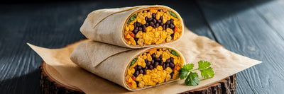High-protein vegan breakfast burrito cut in half.